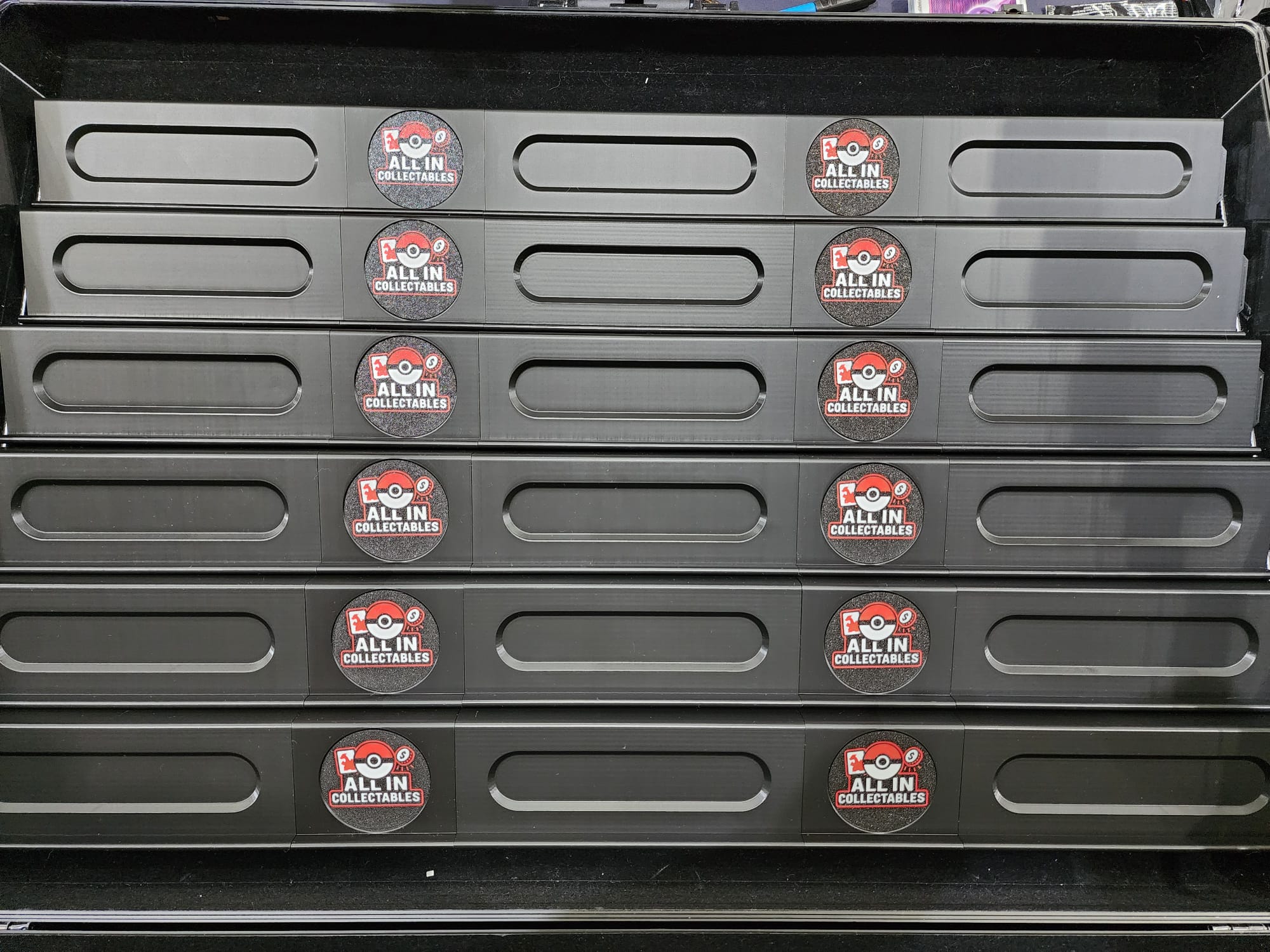 Toploader Risr risers fitted with custom branded inserts
